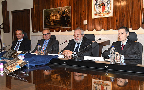 Dr Mario Vella, Governor Central Bank of Malta, flanked by officials from the Bank